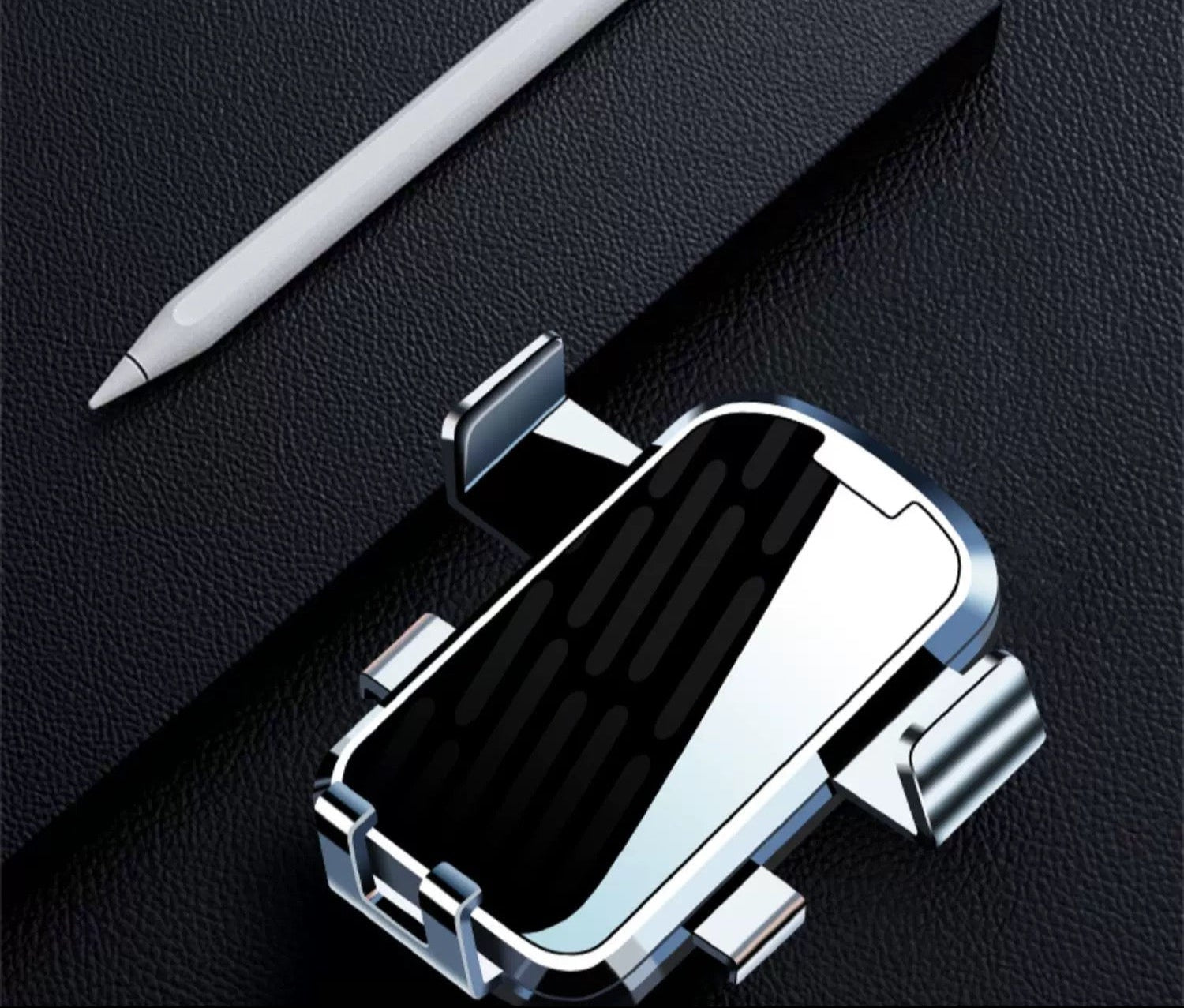 White stylus pen on a black surface with text and product image.