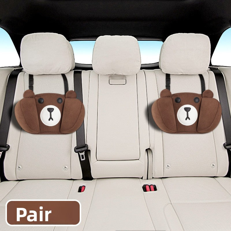 Pair of children's car seat pillows in brown bear design, attached to backseat seatbelts for comfort and protection