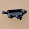 Black car phone holder with text 'Hi I'm Little One' on a beige background