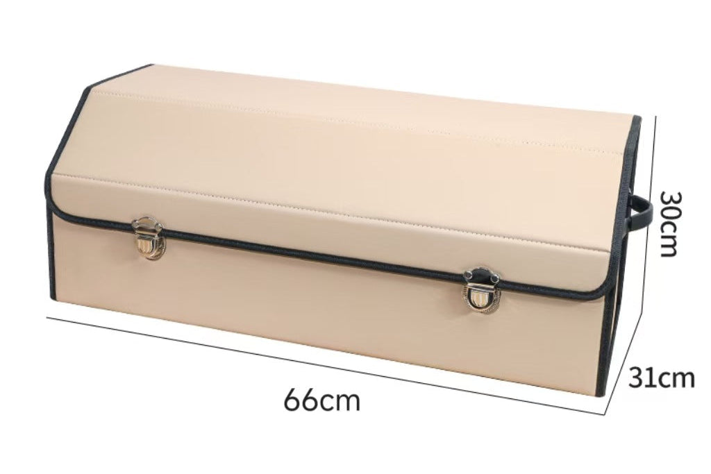 Large beige leather car trunk storage box with black trim and labeled dimensions 66cm x 31cm x 30cm on a white background