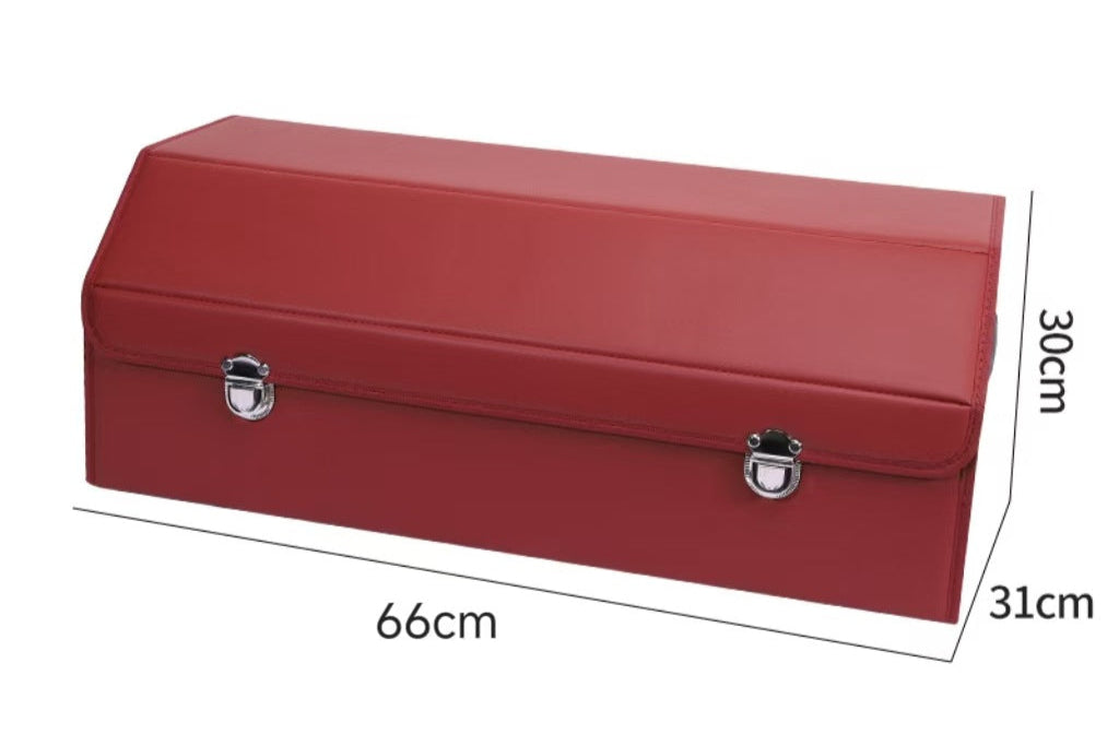 Large red leather car trunk storage box with labeled dimensions 66cm x 31cm x 30cm on a white background